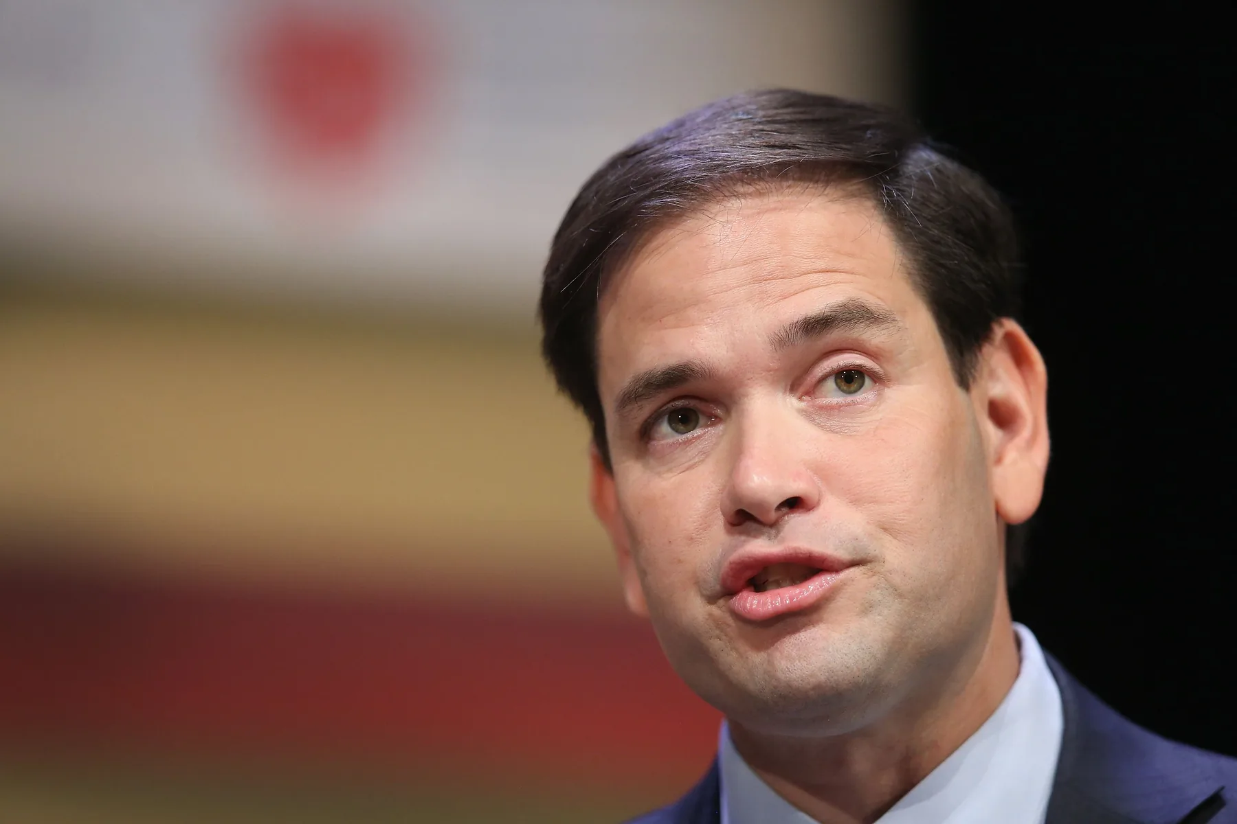 Marco Rubio speaking with Gulf officials during a diplomatic visit in Abu Dhabi focused on Iran peace talks and Strait of Hormuz security concerns.