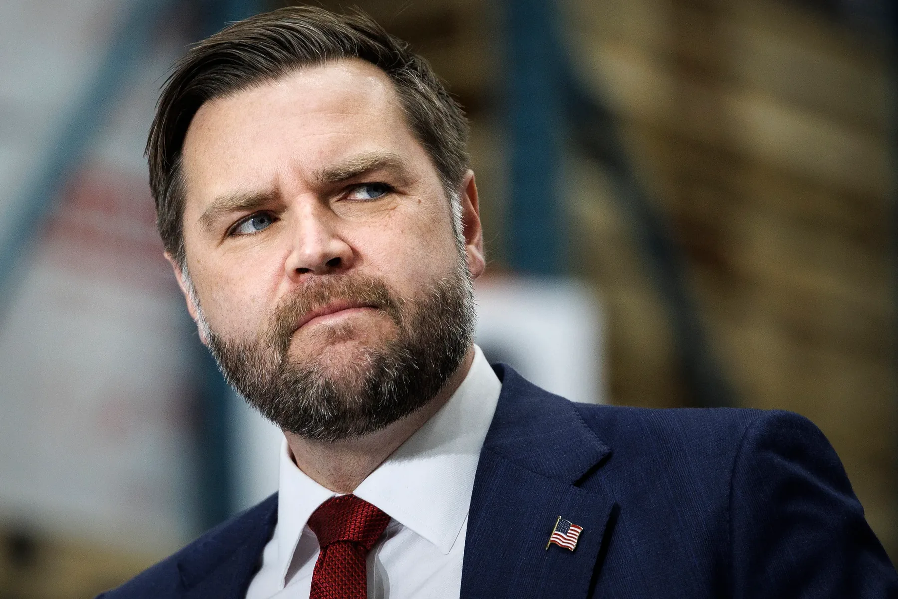 Vice President JD Vance speaks at a podium while defending a U.S.–Iran agreement aimed at ending conflict and outlining a 60-day negotiation framework.