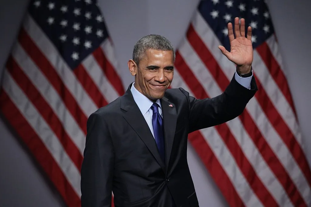 Former President Barack Obama appeared emotional as Michelle Obama praised his leadership and achievements during the opening of the Obama Presidential Center.